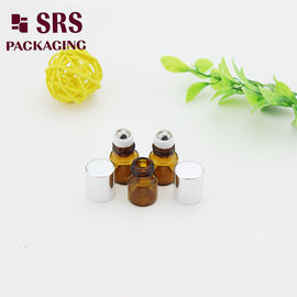 Çelik topu ve alüminyum kapağı olan şişe üzerinde 1 ml süper mini kehribar renkli cam rulo